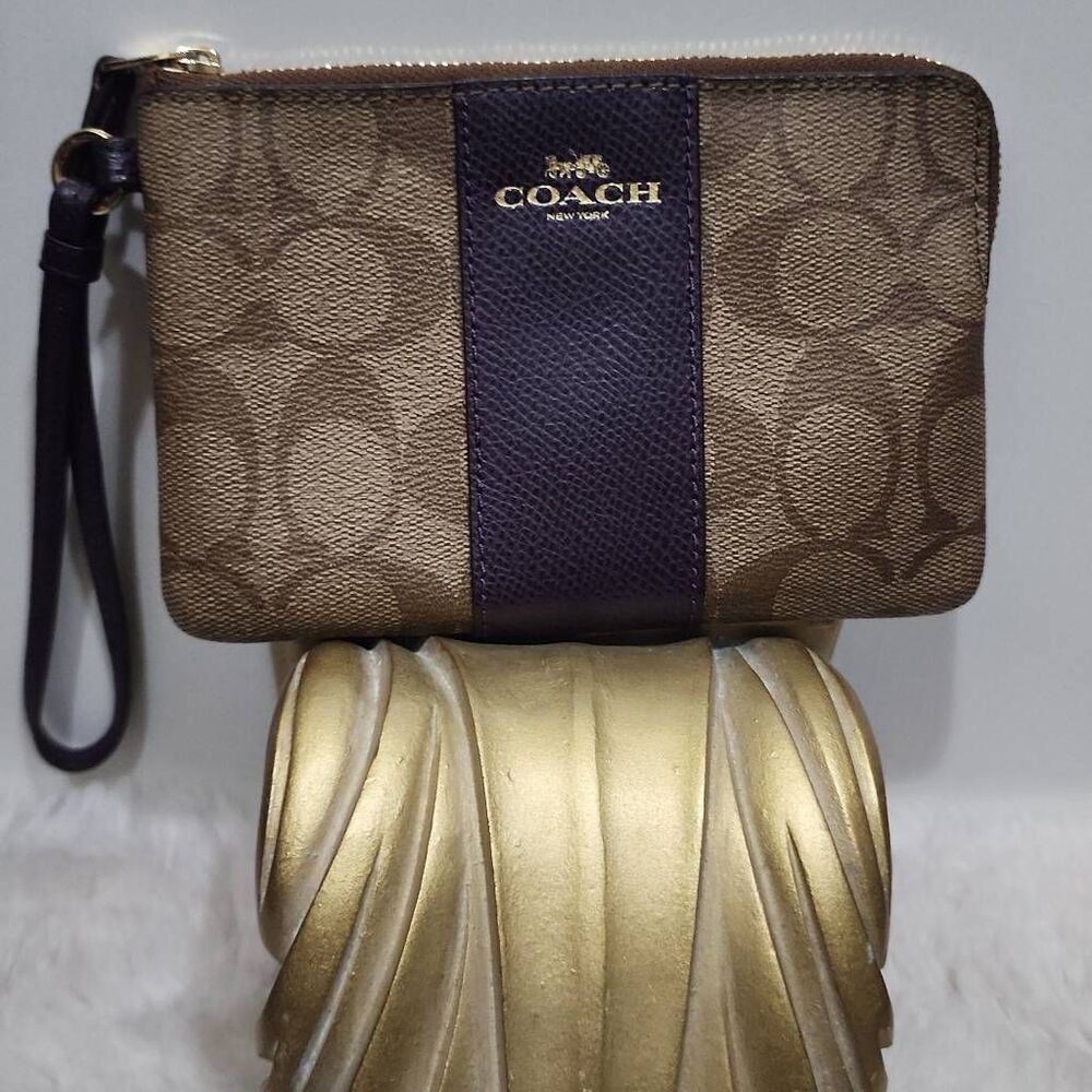 Coach Corner Zip Wristlet in Signature Canvas with Stripe.